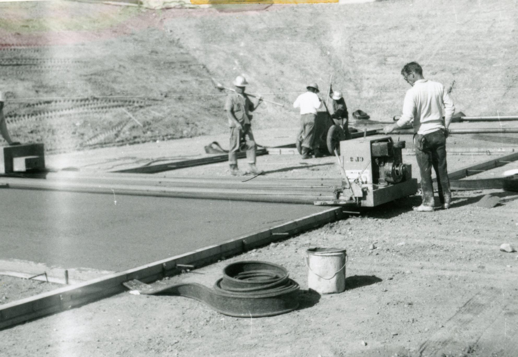 Columbine Historical Image 1 - black and white photo of workers laying cement