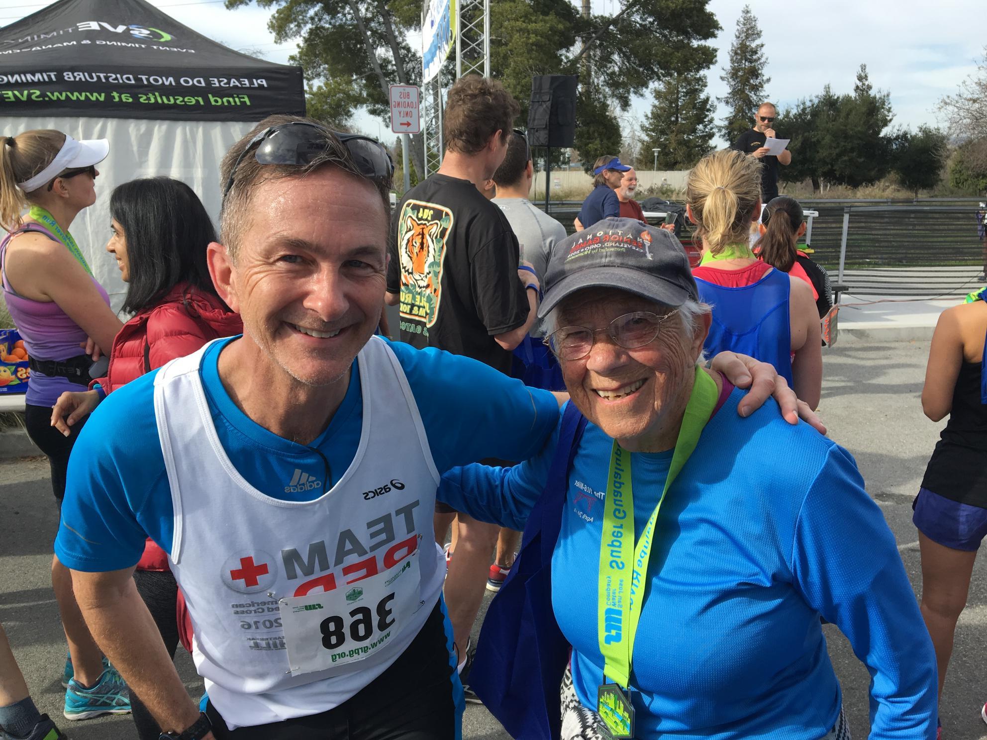 CEO Eric Thornburg standing with Phyllis, a 93 year old runner
